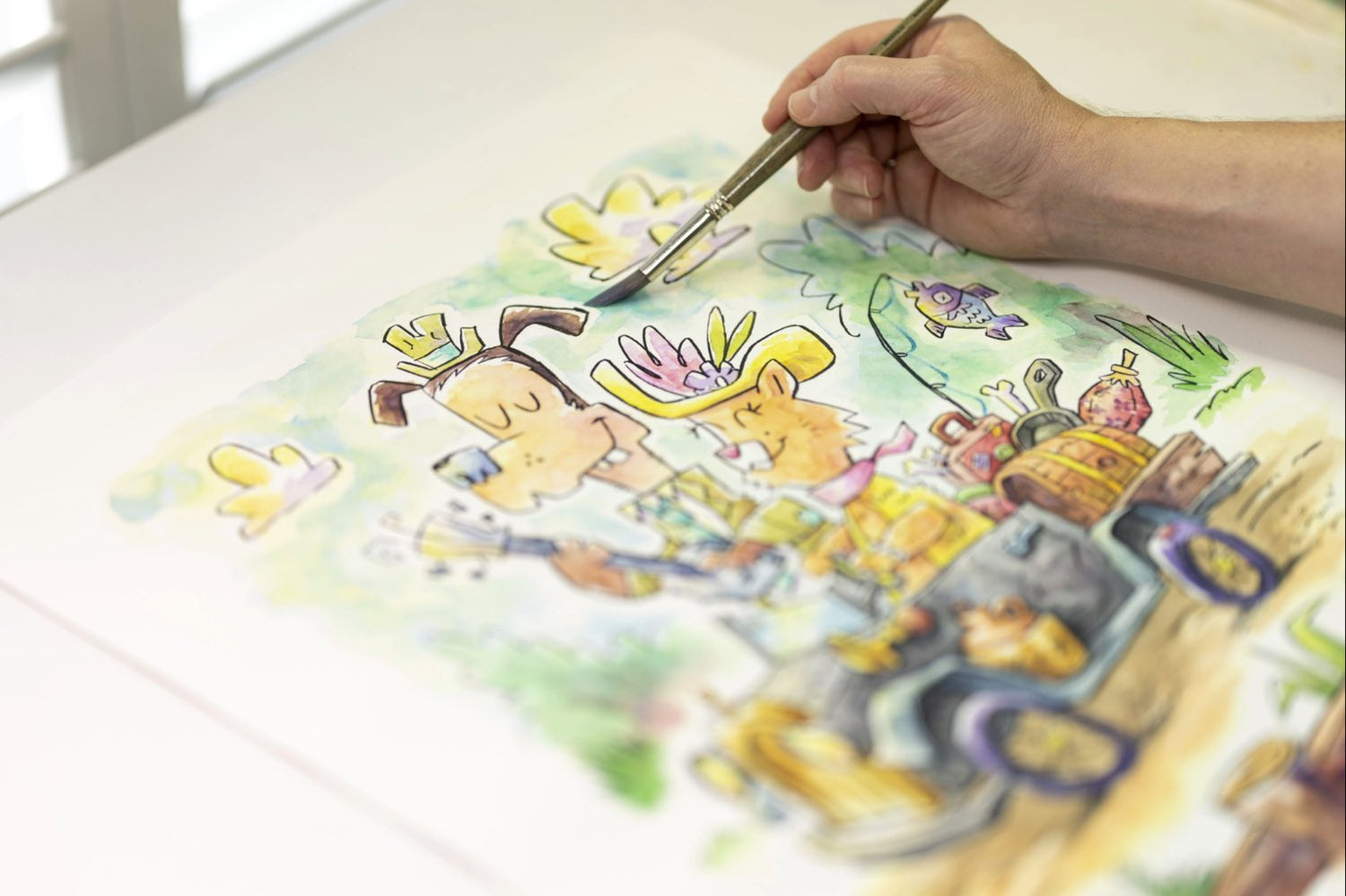 hand creating watercolor art